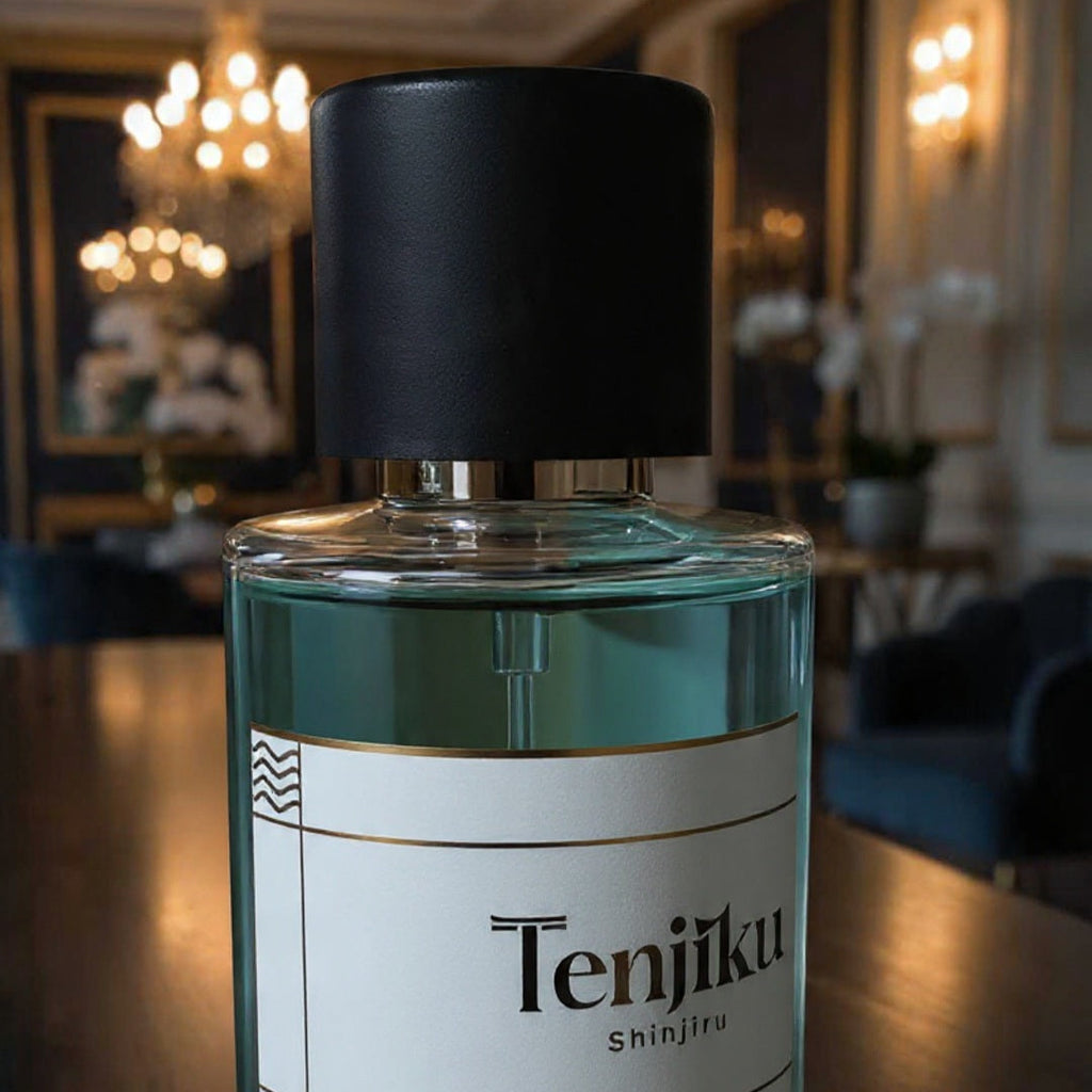 Tenjiku perfume bottle on a wooden surface with a blurred background